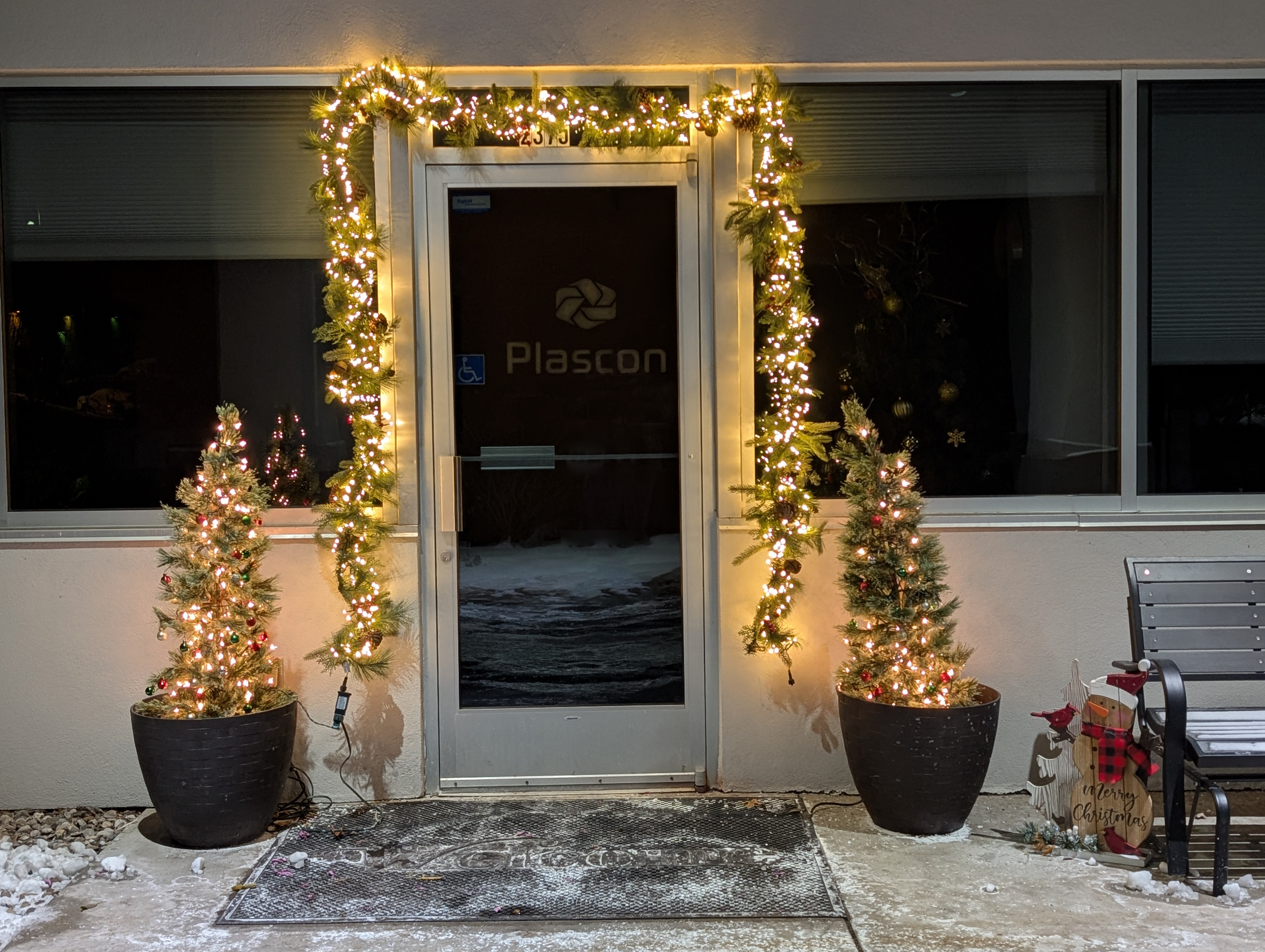 Plascon entrance door decorated in warm white lights 